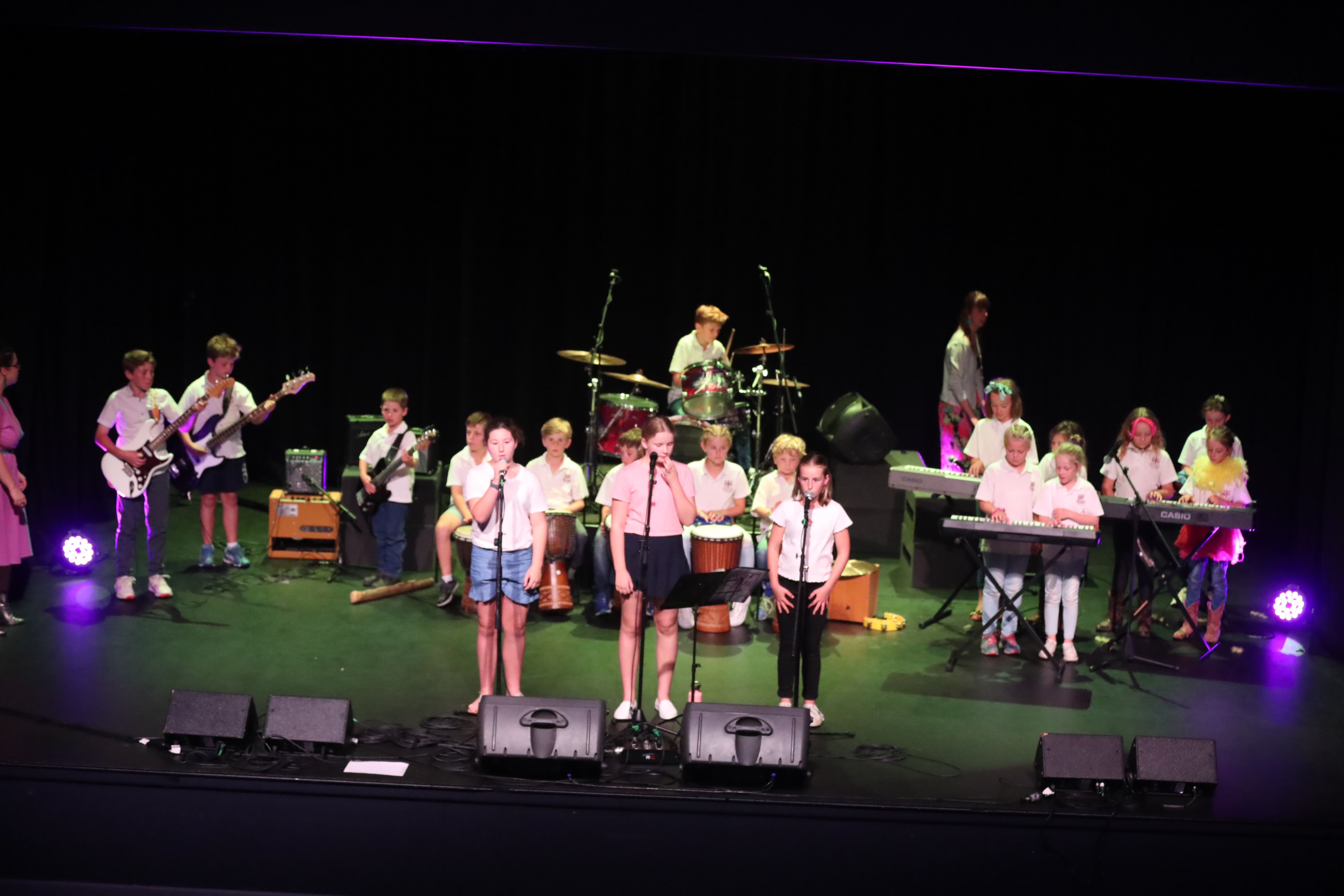 School band on stage performing at festival