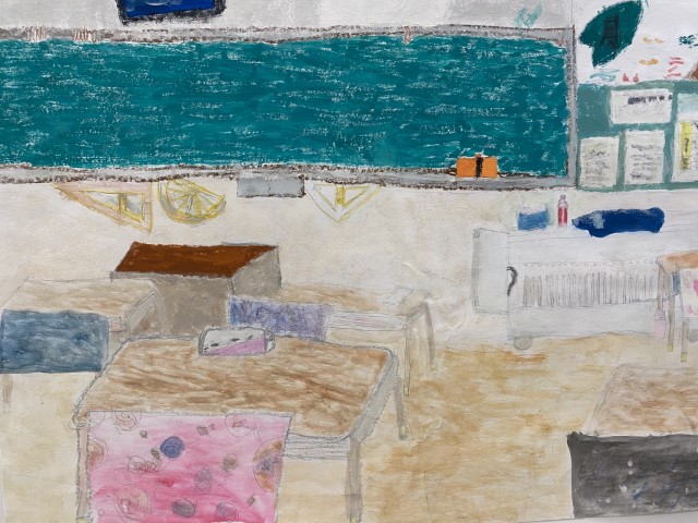 Student artwork of a classroom with a blackboard at the front with maths measuring items underneath.  Thee is also desks and chairs, and a radiator to the side.