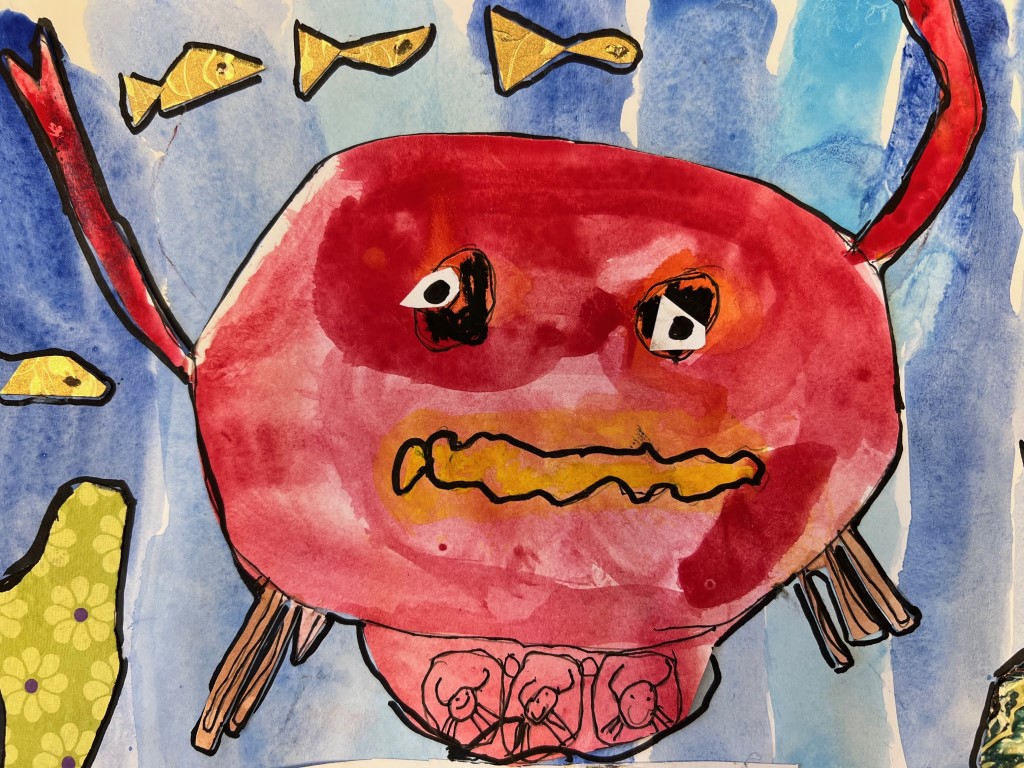 A watercolor painting of a red crab surrounded by fish.