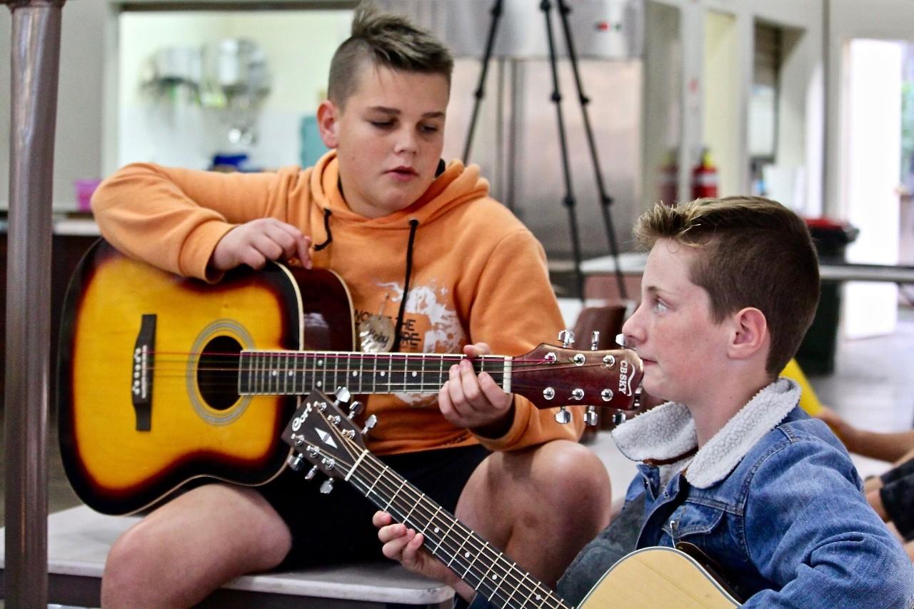 Two guitarists at the SCLS Music Camp