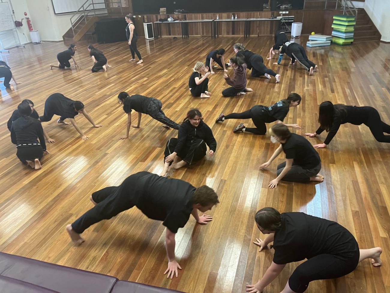 Drama students on floor at workshop